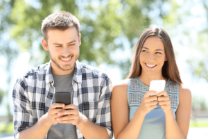 couple having fun texting